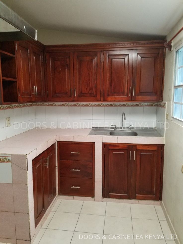 Mahogany Raised-Panel Kitchen — Kitchen Cabinets by Doors and Cabinet EA, Mombasa