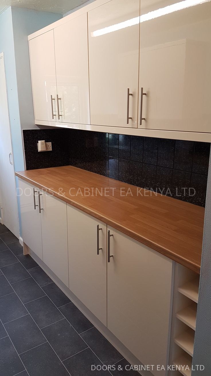 Gloss Cream Kitchen Run — Kitchen Cabinets by Doors and Cabinet EA, Mombasa