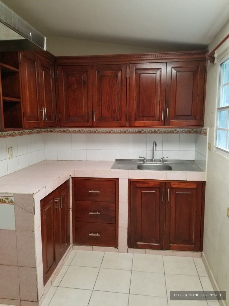 Solid Mahogany Corner Kitchen — Kitchen Cabinets by Doors and Cabinet EA, Mombasa